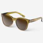 Izipizi #N Golden Green Sunglasses on a white background at Addison West