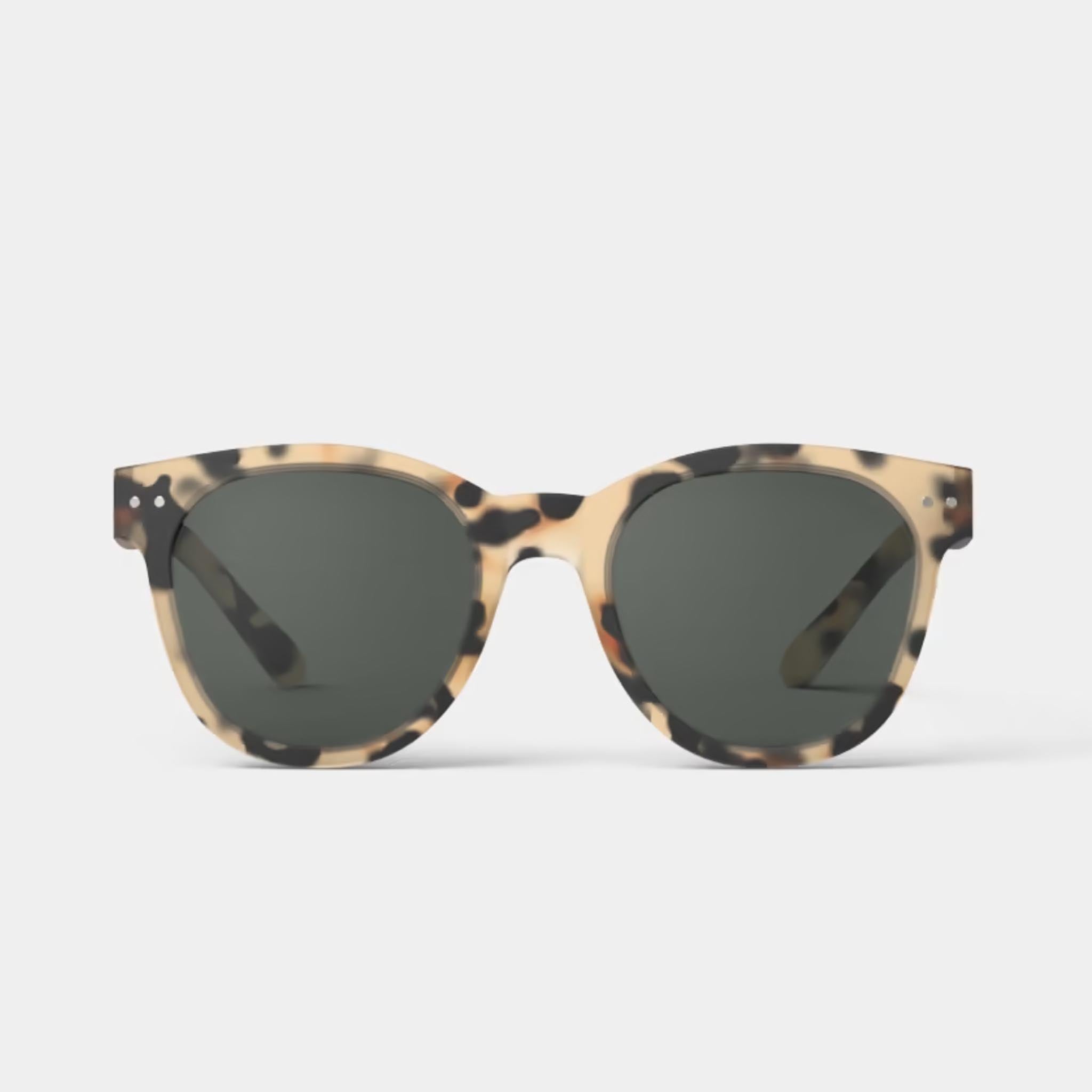 Izipizi #N Light Tortoise Sunglasses on a white background at Addison West