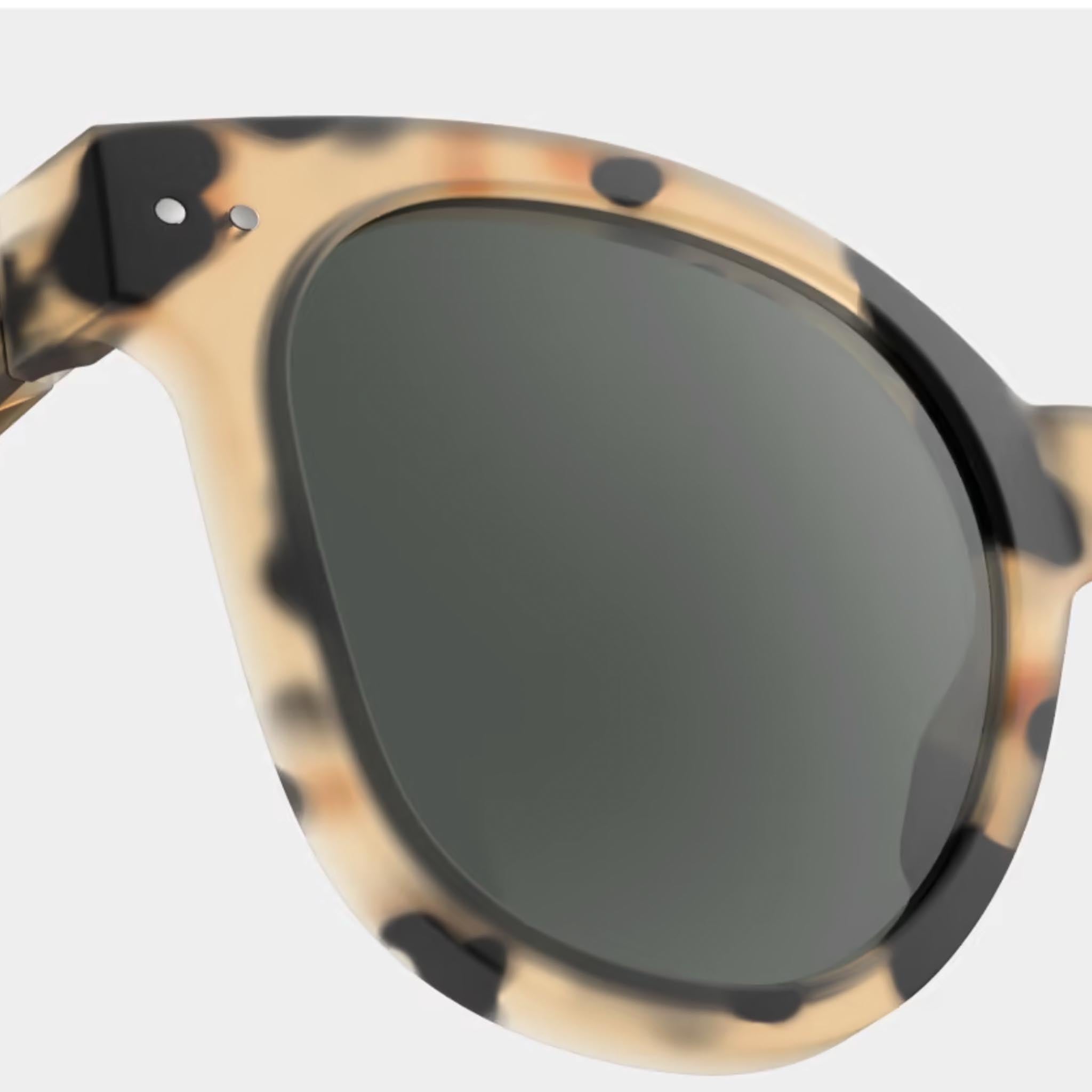 Izipizi #N Light Tortoise Sunglasses on a white background at Addison West