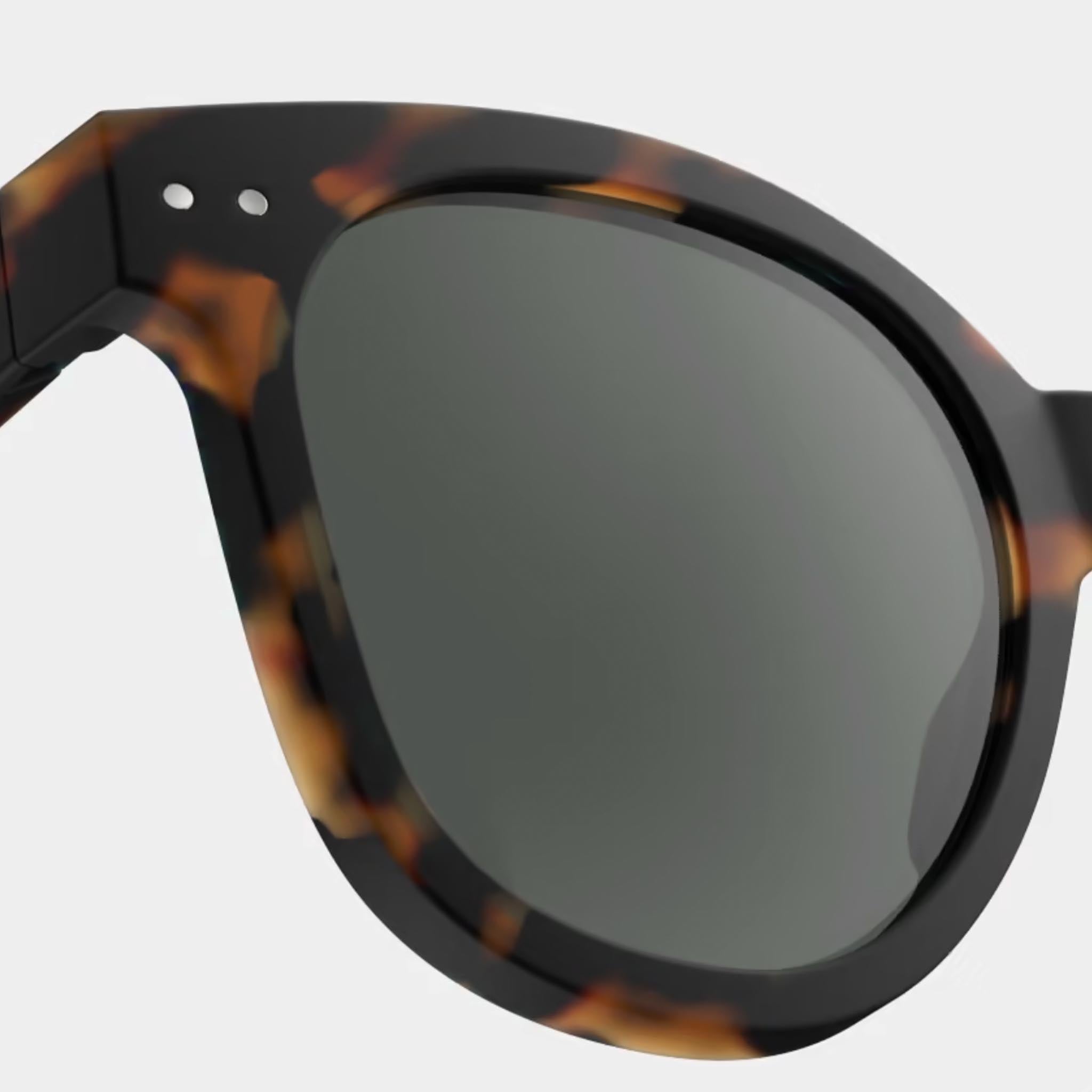 Izipizi #N Tortoise Sunglasses on a white background at Addison West