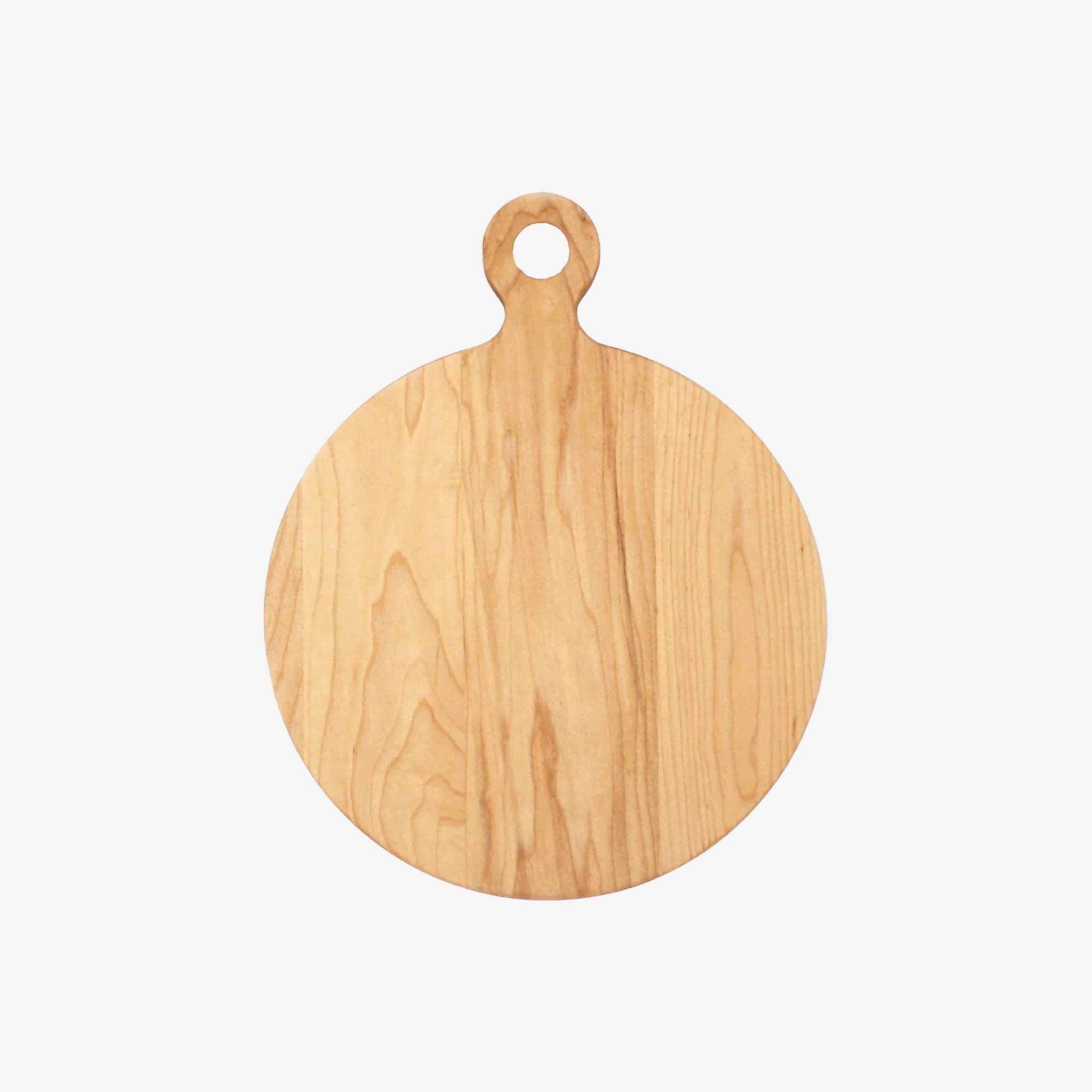 JK Adams Maple Round Cutting Board with a handle on a white background