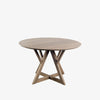 Round wood dining table with open wood braced base on a white background
