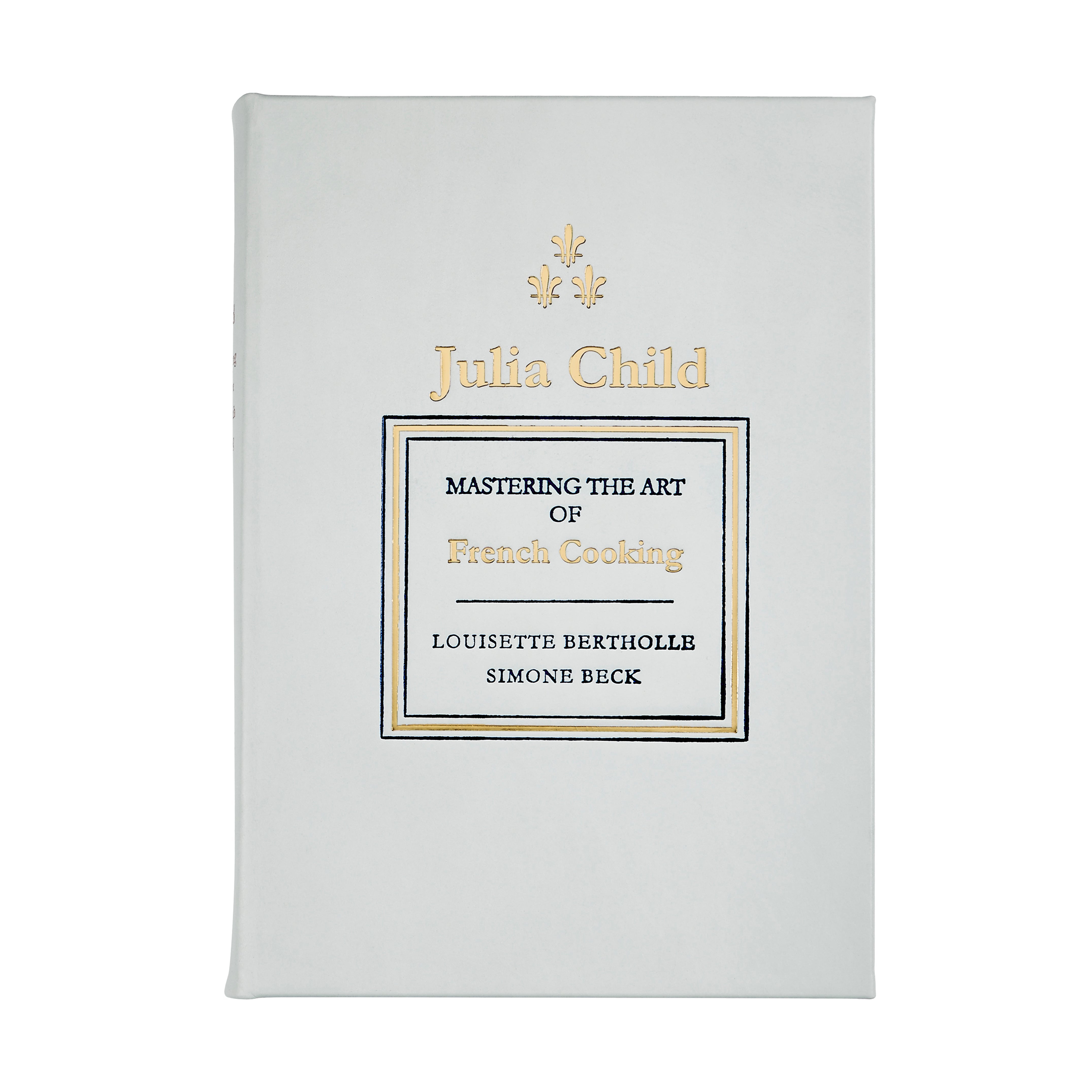 Julia Child's Mastering the Art of French Cooking Leather Bound Edition on white background at Addison West.