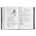 Julia Child's Mastering the Art of French Cooking Leather Bound Edition on white background at Addison West.