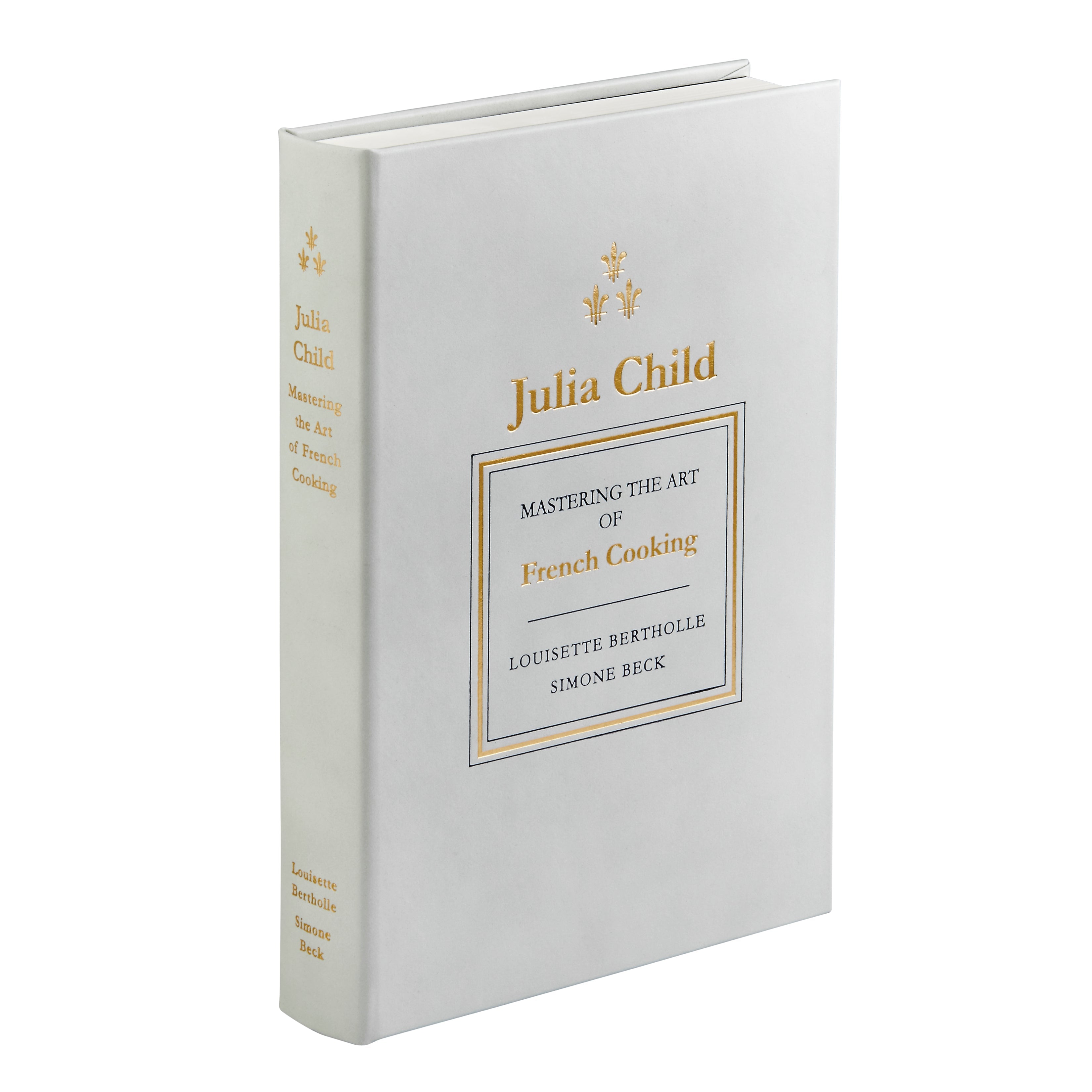 Julia Child's Mastering the Art of French Cooking Leather Bound Edition on white background at Addison West.