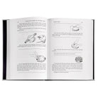 Julia Child's Mastering the Art of French Cooking Leather Bound Edition on white background at Addison West.