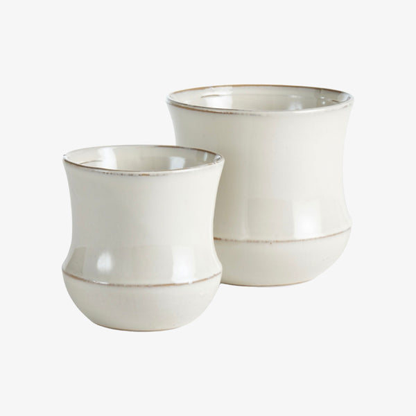 Set of two white pots with slightly flared lip and base on a white background
