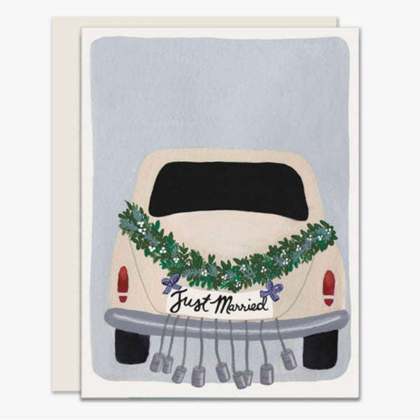 Just Married Greeting Card with illustration of car with garland and cans behind it on a white background