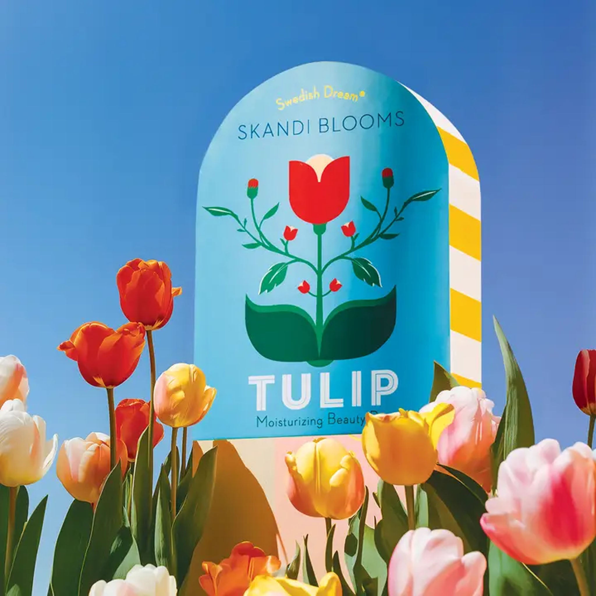 Kalastyle Tulip Soap on a blue background with tulips at Addison West