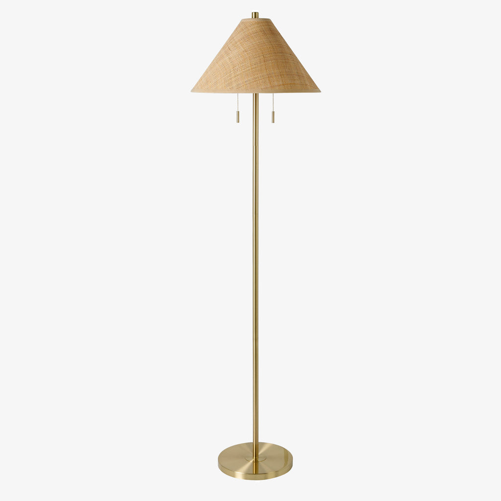 Surya Lacona brass floor lamp with seagrass shade on a white background 