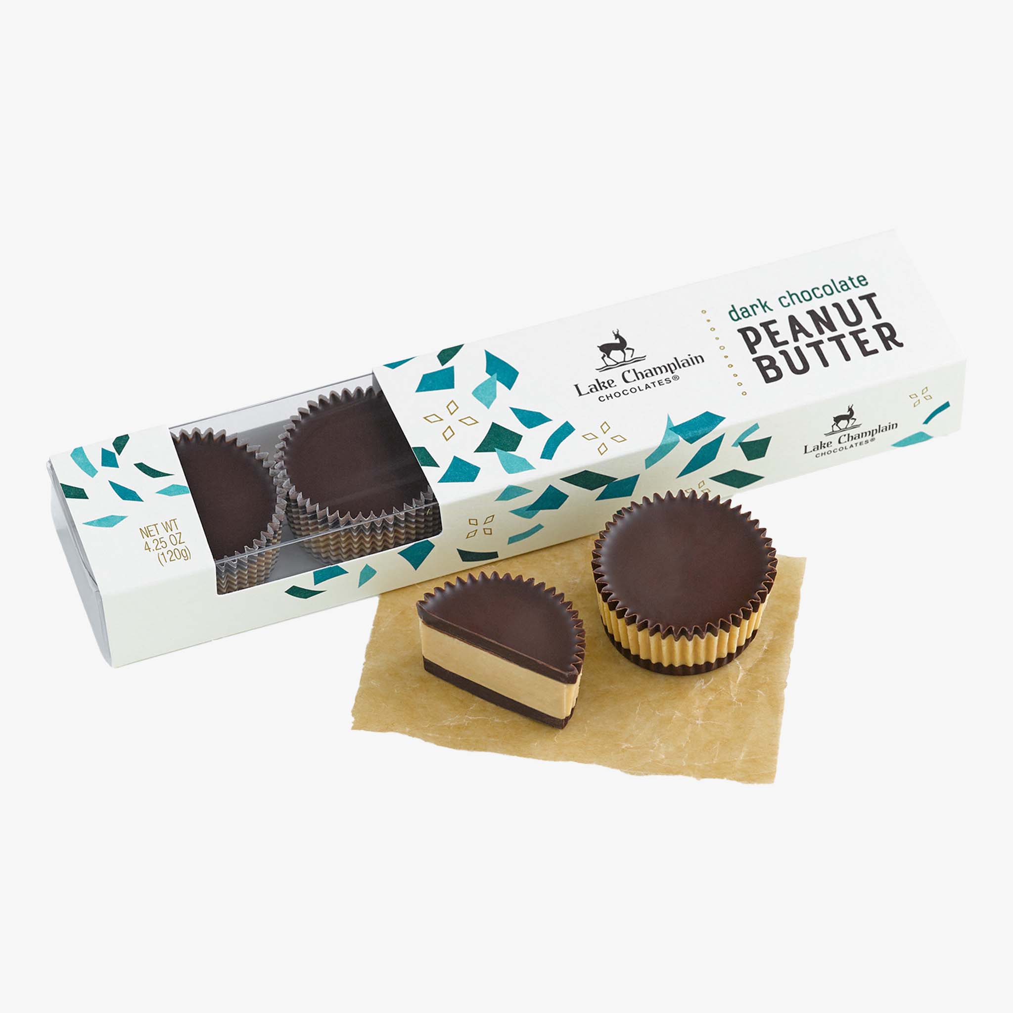 Dark chocolate peanut butter cups with packaging on a white background