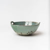 Blue Green glazed berry bowl on a white background