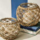 Lattice Wrapped Votive - Small and large on a table at Addison West