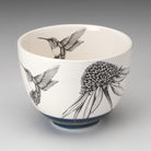 Laura Zindel Hummingbird #4 Small Bowl with blue bottom on grey background.