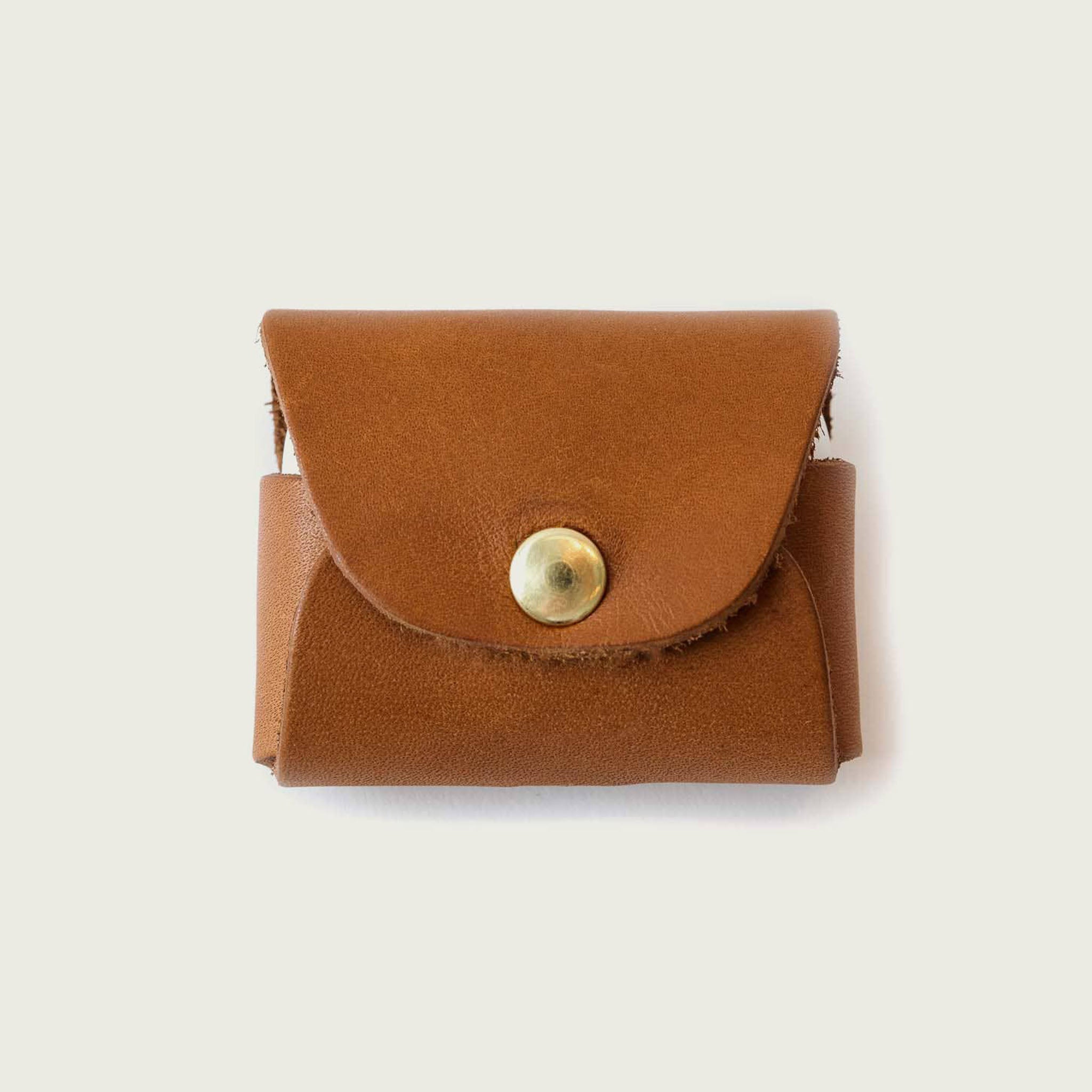 Leather AirPods Case on a white background at Addison West