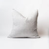 Light grey stripe linen pillow with slight ridge on a white background