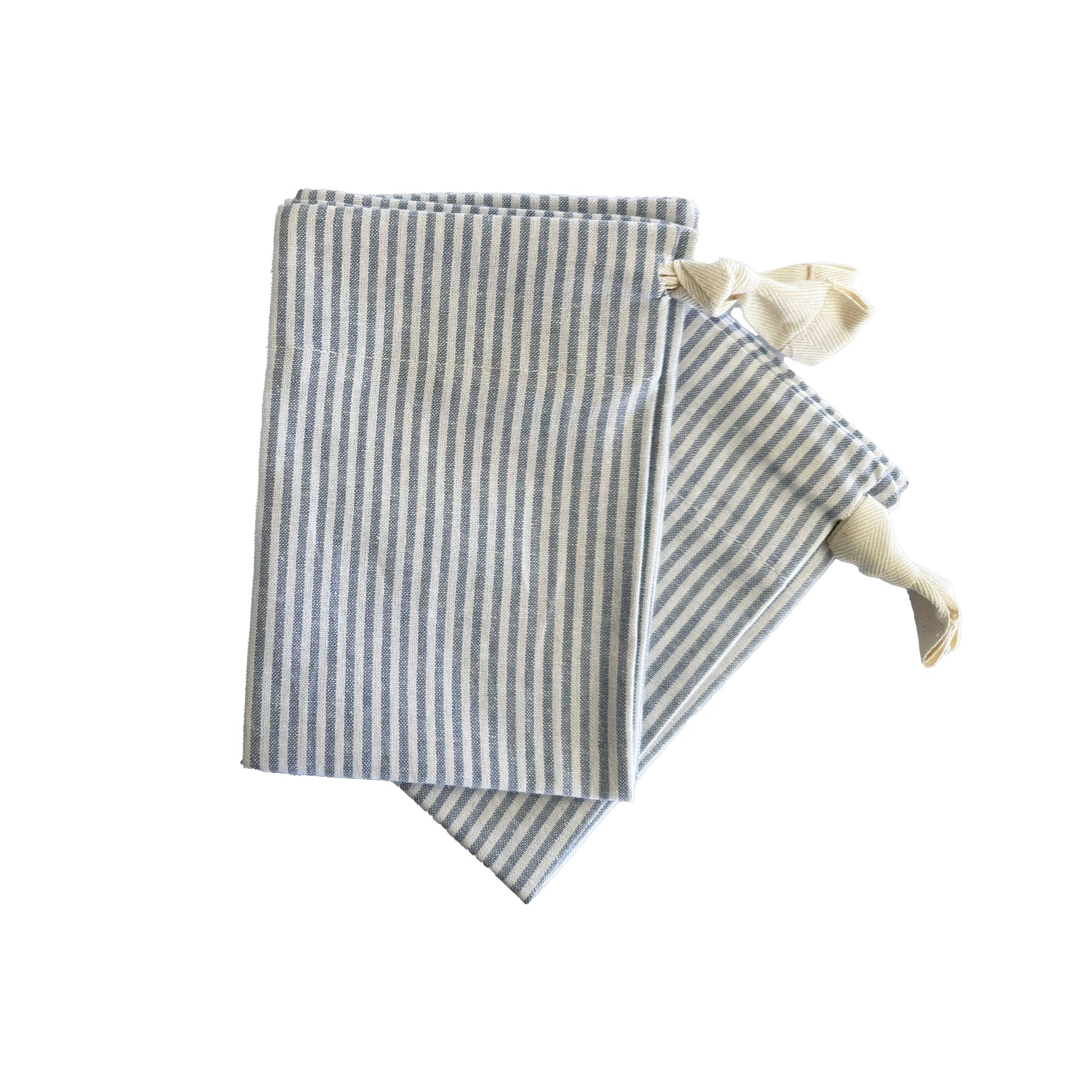 Striped linen bread bags on a white background