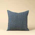 20" Linen Chambray Pillow in Denim on a beige background at Addison West
