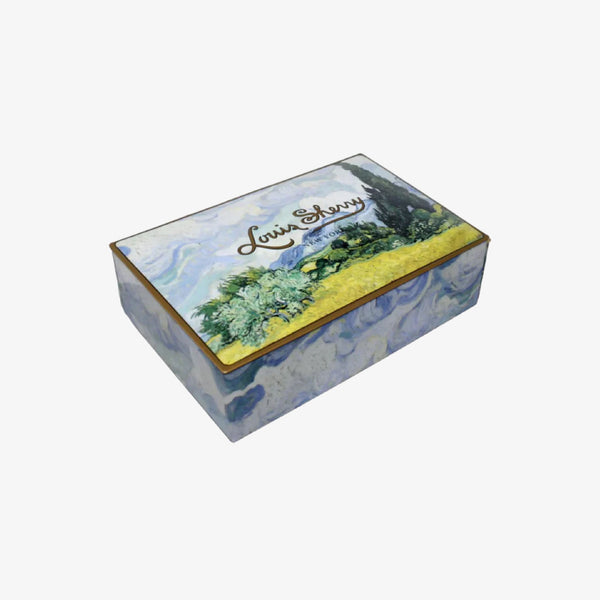 Louis Sherry 12 piece tin of chocolates in Met Museum van gogh decorated box on a white background