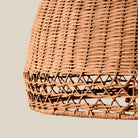 Close up of Woven Augusta Floor Lamp on a beige background at Addison West