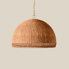 Augusta Chandelier on a beige background at Addison West