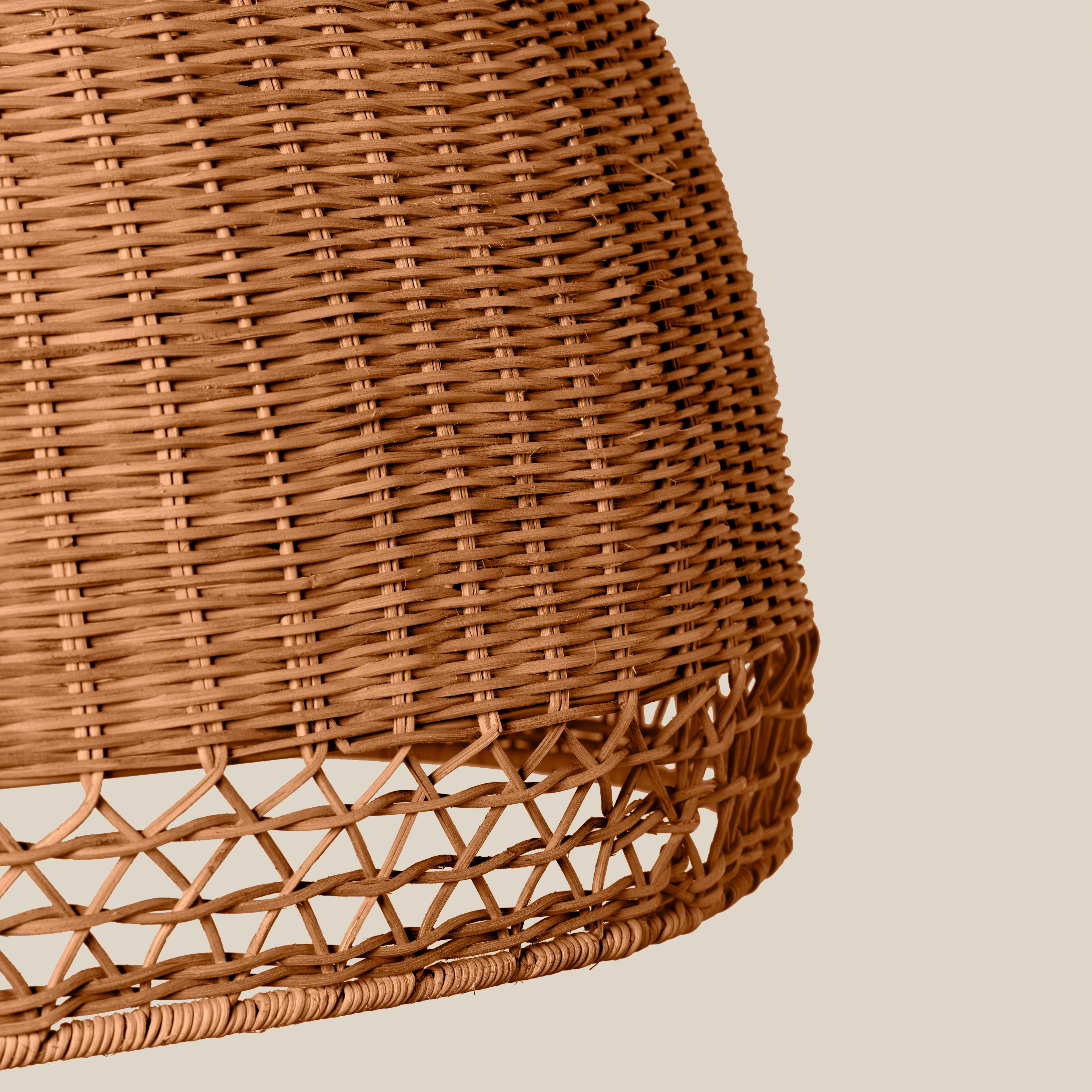 Close up of Augusta Chandelier on a beige background at Addison West