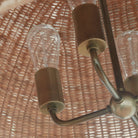 Close up of Augusta Chandelier on a beige background at Addison West