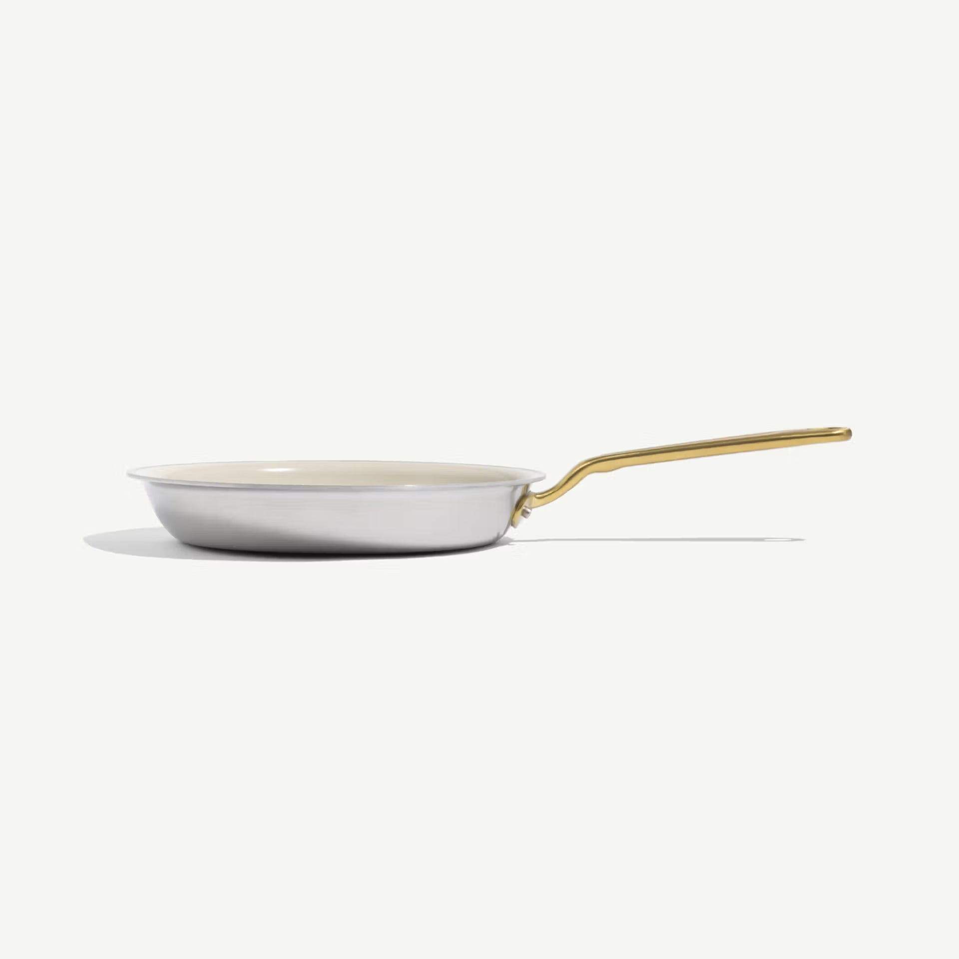 Made In CeramiClad™ 10” Non-stick Fry Pan in Antique Brass on a white background at Addison West