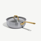 Made In Stainless Clad 3 qt. Saucier with Lid in Antique Brass on a white background at Addison West