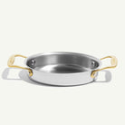 Made In Stainless Steel Gratin Dishes in Antiqued Brass on plain background.