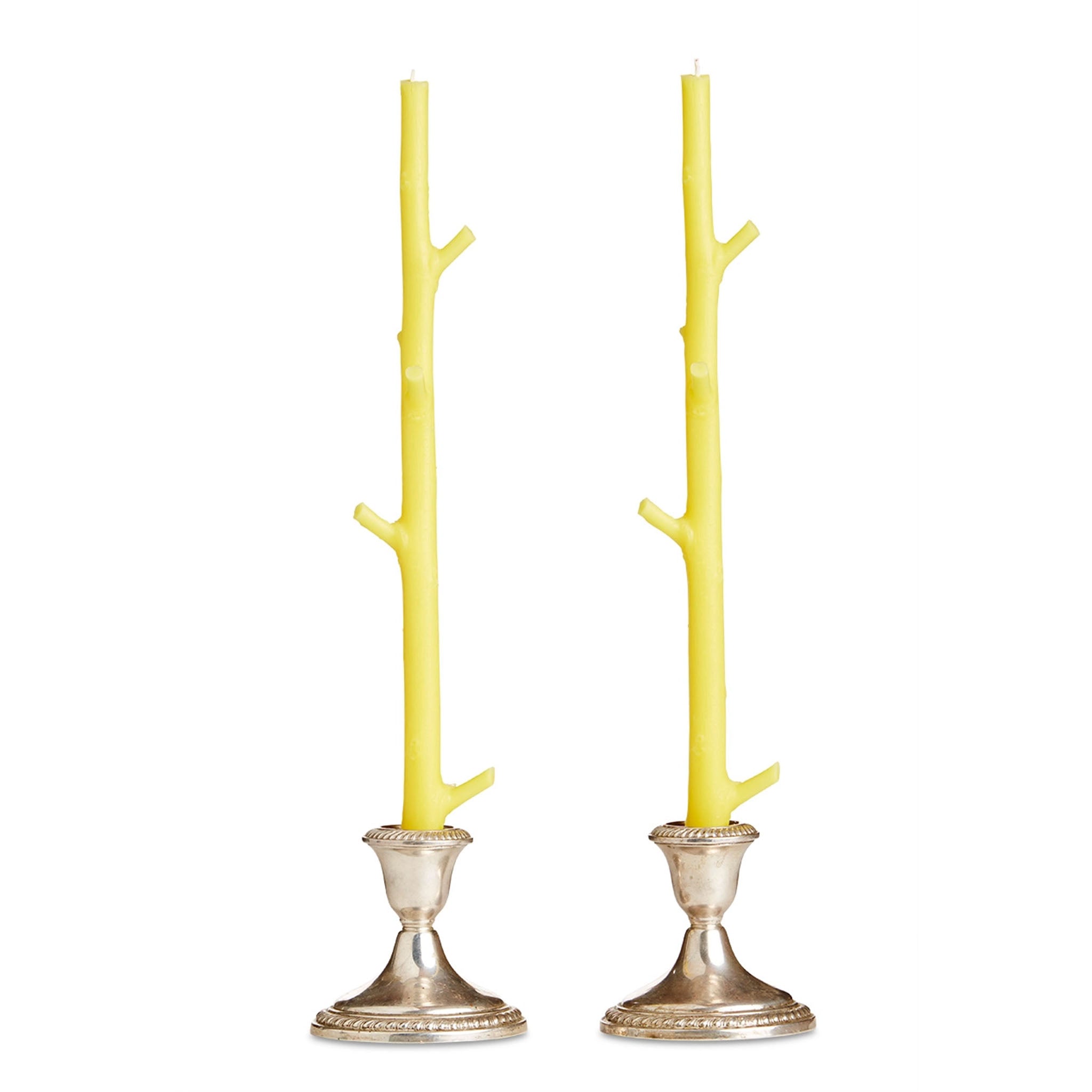 Maple Stick Candle Pair in Lemon Sorbet in silver candle holders on a white background