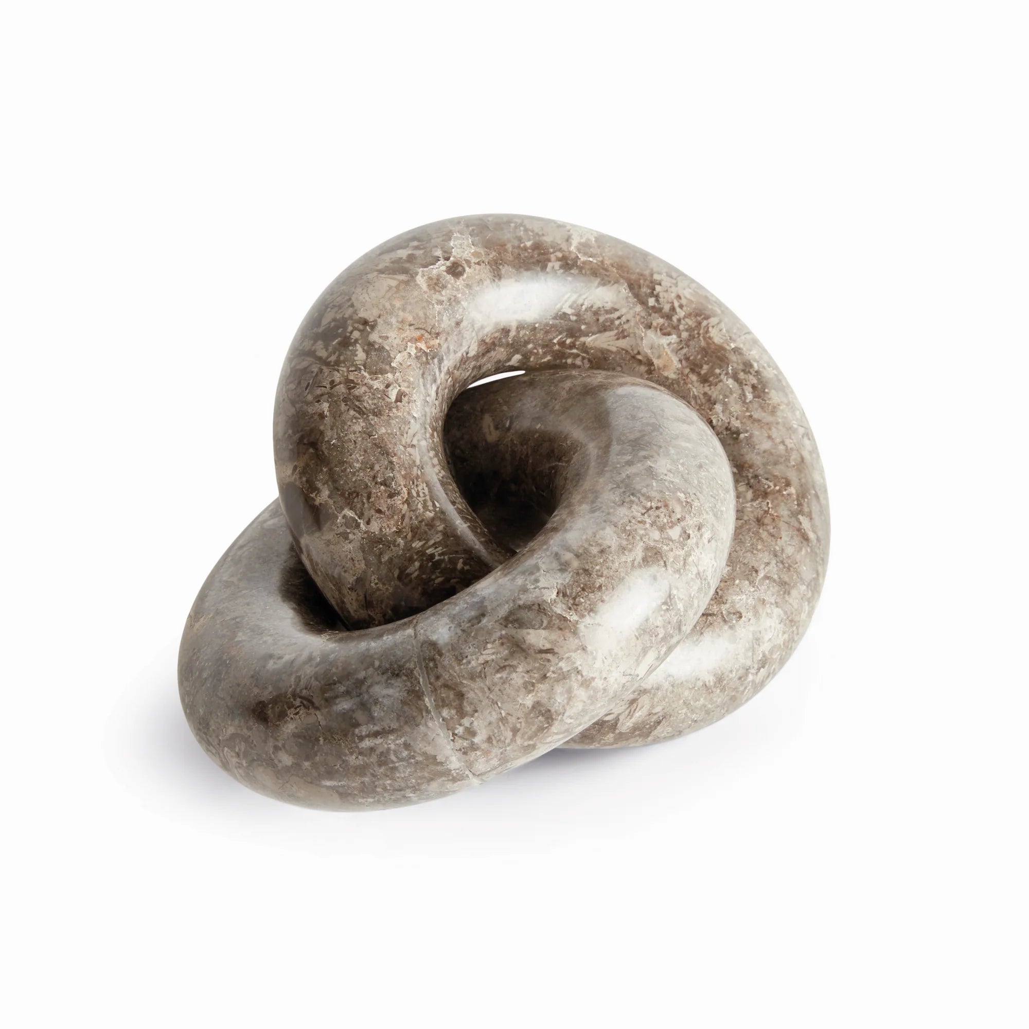 Marble Links Sculpture on white background at Addison West.