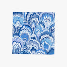 Caspari Marbled Ceramica Indigo Cocktail Napkin on a white background