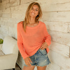 Marina Crew Mercer in Cantaloupe on a model on a white background at Addison West