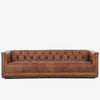 Four Hands furniture brand Maxx Chesterfield style Sofa in Heirloom Sienna leather on a white background