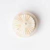 View of top of Round white bone box with layered rotunda shape on a white background