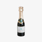 Mini Champagne Bottle Candle on a white background at Addison West
