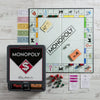 Retro style monopoly game on a wood surface