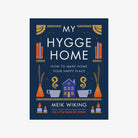 Navy blue front cover of My Hygge Home book with illustrations of home on a white background