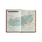 National Parks Green Leather Pocket Atlas on white background at Addison West.