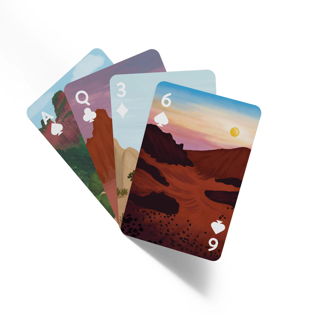 Four cards from National Parks Playing Card deck with illustrations for 15 parks on a white background
