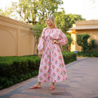 Maison Marigold Newport Skirt in Pink and Orange on a model at Addison West