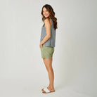 Oahu 4“ Short in Olive shown on model on plain background.