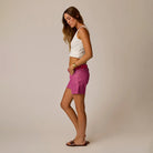 Oahu 4“ Short in Rouge shown on model on plain background.