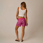 Oahu 4“ Short in Rouge shown on model on plain background.