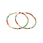 Ocean Breakup Large Beaded Hoop Earrings in Coral on white background at the Addison West.