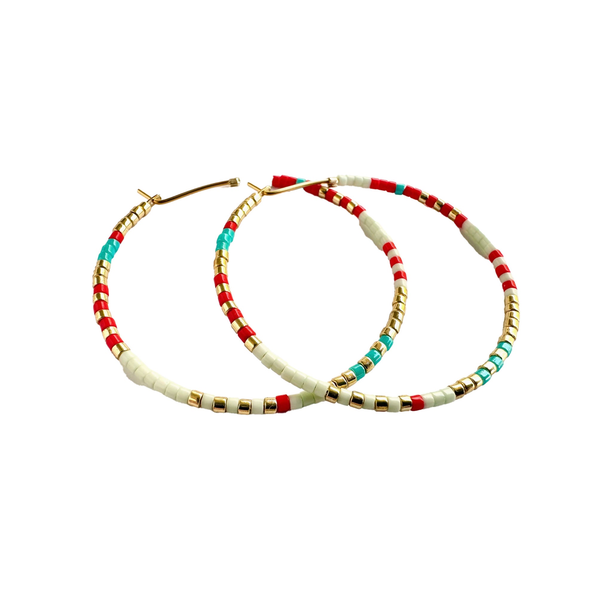 Ocean Breakup Large Beaded Hoop Earrings in Coral on white background at the Addison West.