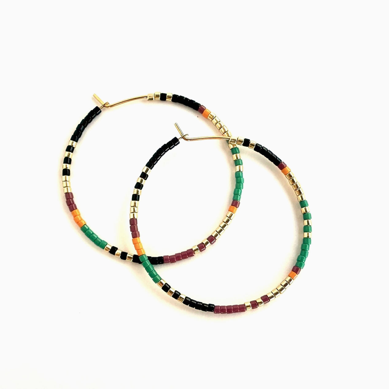 Ocean Breakup Large Beaded Hoop Earrings in Jungle on white background at the Addison West.