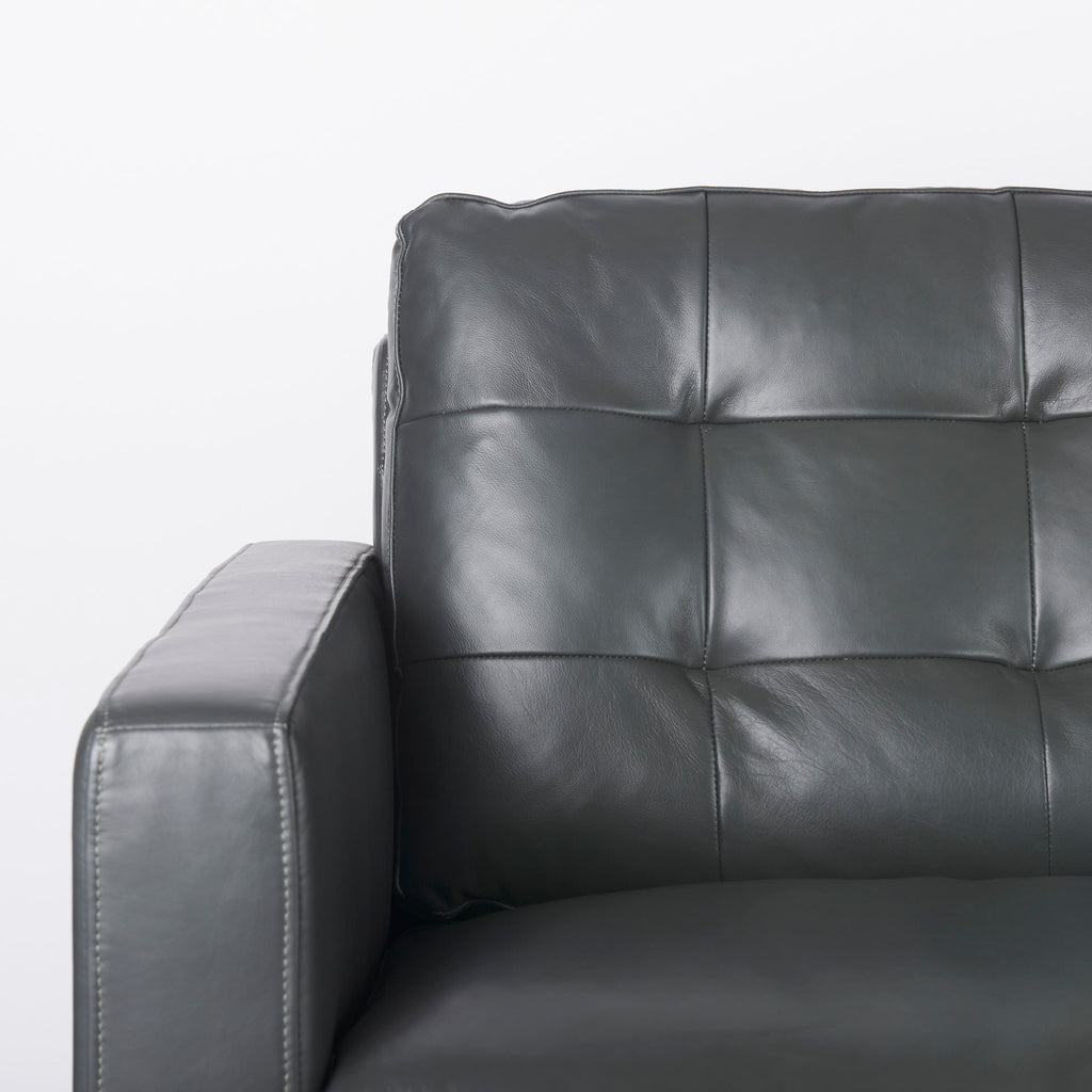 Close up of Olaf Grey Leather Sofa on a white background on a white background