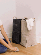 Uashmama Laundry Hamper Bag in a laundry room at Addison West